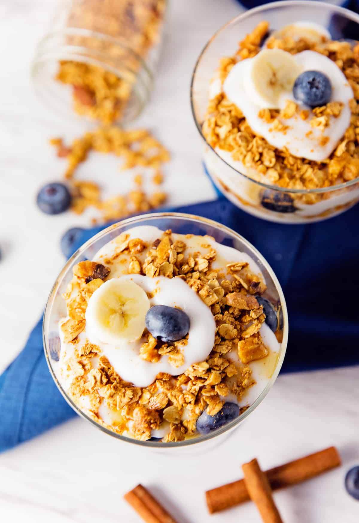 banana cinnamon parfait, banana parfait, cinnamon parfait, fruit parfait, blueberry parfait, blueberries, banana, parfait, recipe, vegan, vegetarian, whole food plant based, oil free, no oil, refined sugar free, no refined sugar, breakfast, dessert, simple, east, fast, 30 minutes, healthy, vegan parfait, whole food plant based parfait, whole food plant based recipe, whole food plant based breakfast, gluten free, gluten free recipe, gluten free breakfast, granola, berries, maple syrup, cinnamon, oats, minimally processed, meals, unprocessed