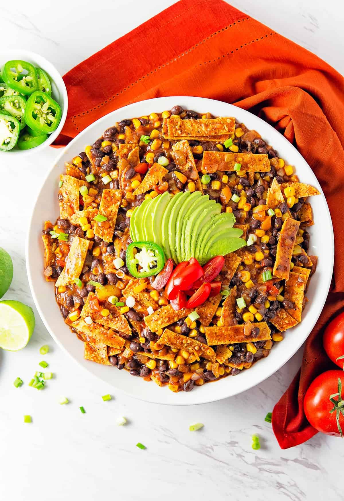 enchilada skillet, enchilada, enchiladas, tortillas, recipe, enchilada recipe, enchilada skillet recipe, vegan, vegan recipe, whole food plant based recipe, whole food plant based, vegetarian, vegetarian recipe, gluten free, gluten free recipe, vegan dinner, vegan meals, vegetarian dinner, vegetarian meal, whole food plant based dinner, whole food plant based meal, gluten free dinner, gluten free meal, healthy, oil free, no oil, bell peppers, corn, black beans, enchilada sauce, peppers, tomato, quick dinner, fast dinner, entertaining, wfpb, dairy free, no dairy, traditional, Mexican, classic, delicious, the best, winter, fall, spring, summer, fast, easy, quick, simple, 30 minutes,