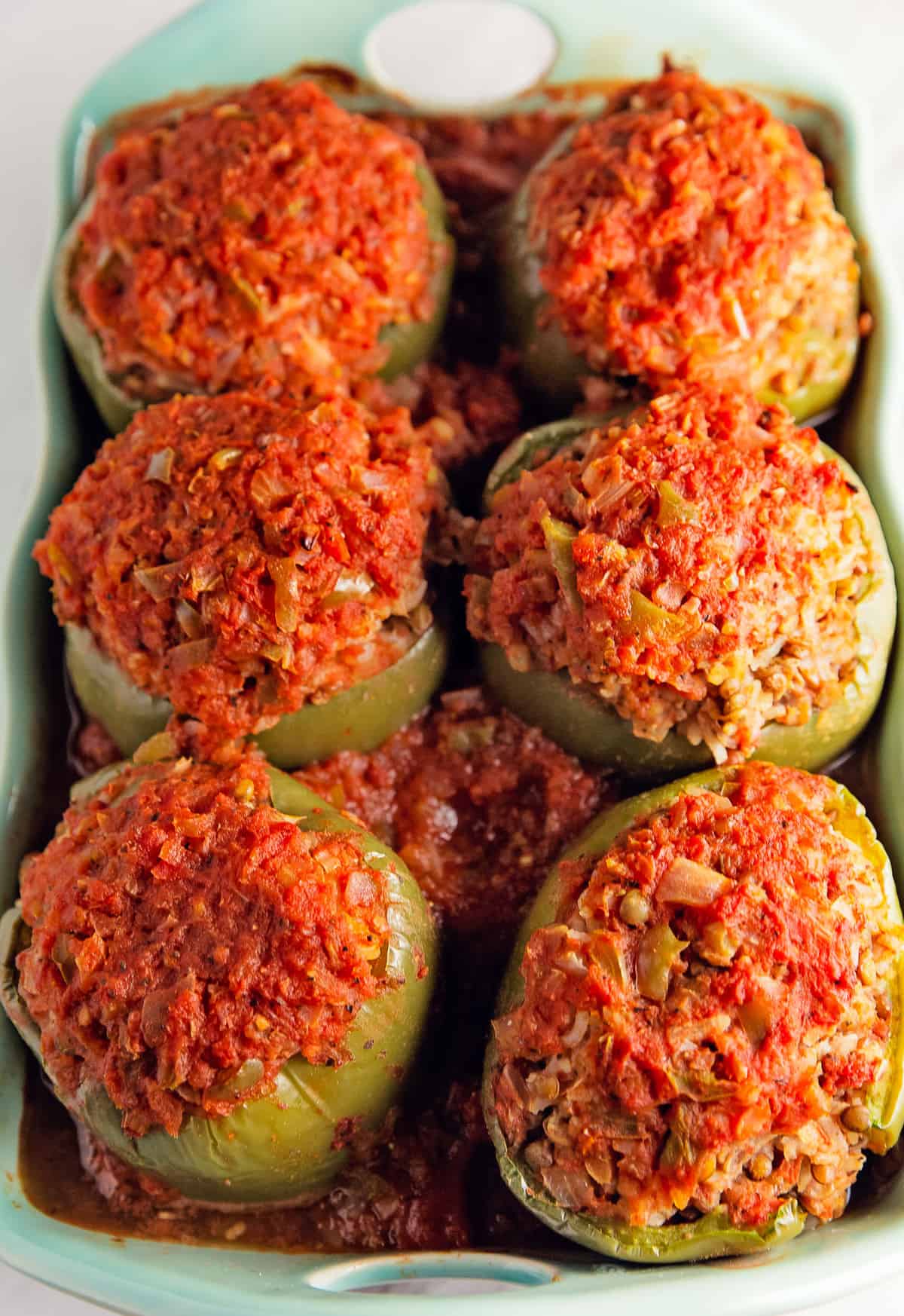 old fashioned stuffed peppers, stuffed peppers, peppers, bell peppers, recipe, stuffed pepper recipe, vegan, vegan recipe, whole food plant based recipe, whole food plant based, vegetarian, vegetarian recipe, gluten free, gluten free recipe, vegan dinner, vegan meals, vegetarian dinner, vegetarian meal, whole food plant based dinner, whole food plant based meal, gluten free dinner, gluten free meal, healthy, oil free, no oil, tomatoes, rice, lentils, mashed potatoes, red gravy, tomato gravy, entertaining, wfpb, dairy free, no dairy, traditional, American, classic, delicious, the best, winter, fall, spring, summer