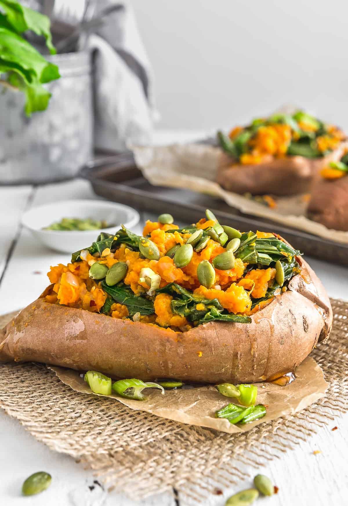 Collard Green Stuffed Sweet Potatoes, collard greens, sweet potatoes, vegan stuffed sweet potatoes, vegan dinner, vegan collard greens, vegan meals, plant based, vegan, vegetarian, whole food plant based, gluten free, recipe, wfpb, healthy, healthy vegan, oil free, no refined sugar, no oil, refined sugar free, dairy free, vegan lunch, dinner, lunch, easy recipe, potatoes, greens, summer