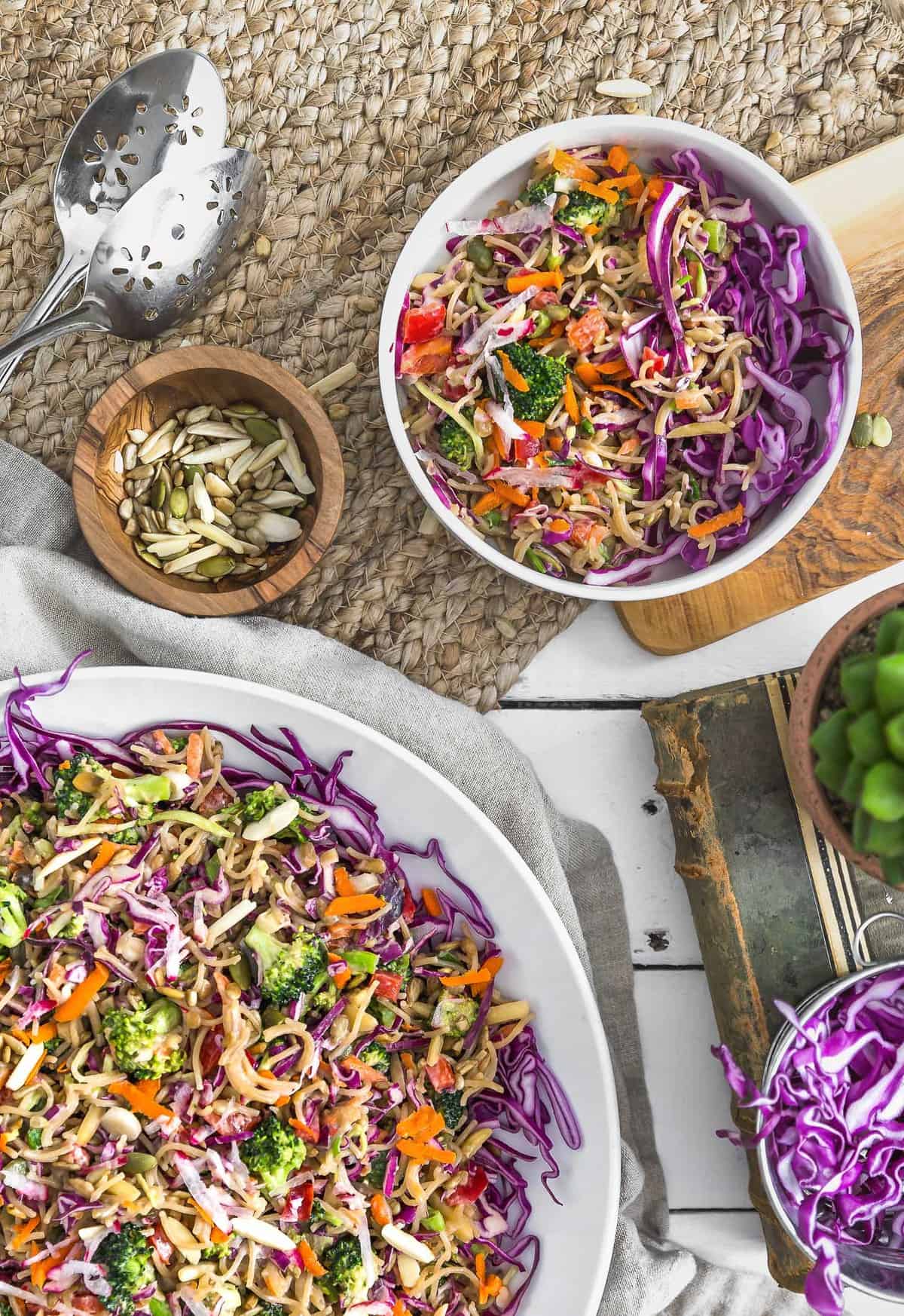 No Oil Broccoli Noodle Slaw, vegan salad, vegan slaw, vegan dinner, broccoli slaw, noodles, vegan noodles, plant based, vegan, vegetarian, whole food plant based, gluten free, recipe, wfpb, healthy, healthy vegan, oil free, no refined sugar, no oil, refined sugar free, dairy free, vegan dressing, vegan lunch, salad, dinner, lunch, easy recipe, dressing, broccoli, summer, picnic, party, entertaining