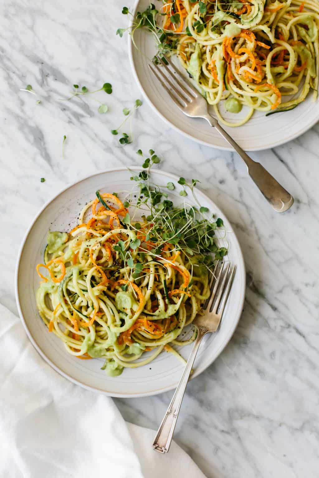 Carrot and zucchini pasta with avocado cucumber sauce
