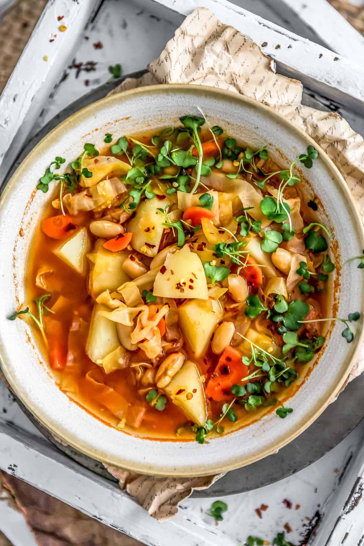 Flatlay of vegan Cabbage Potato Bean Soup