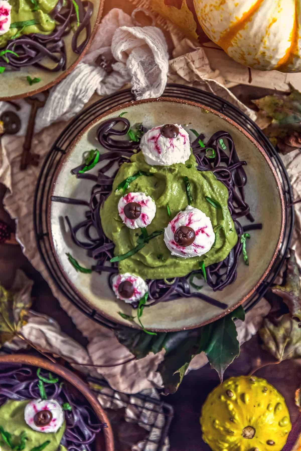 Plates of Spooky Spinach Halloween Pasta