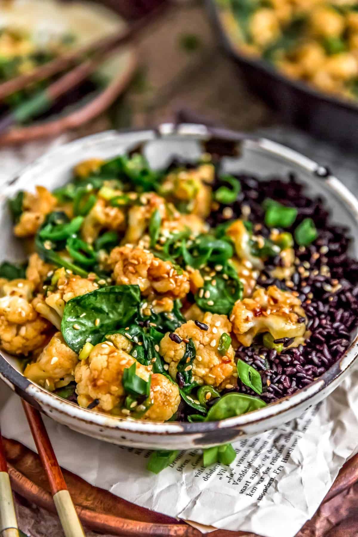 Close up of Vegan Korean BBQ Cauliflower in a bowl with rice