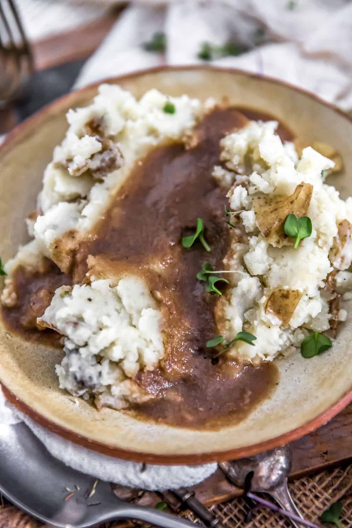 Fast and Easy Vegan Gravy over garlic smashed potatoes