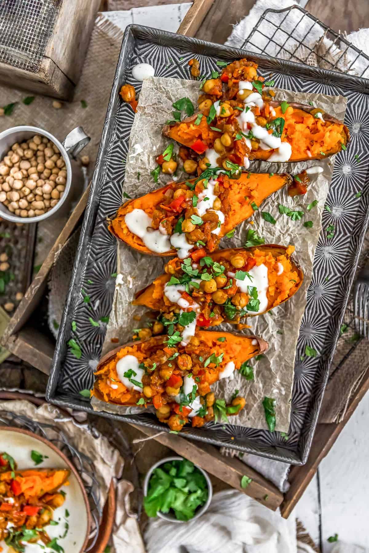 Moroccan Spiced Chickpeas and Garlic Sauce over sweet potatoes