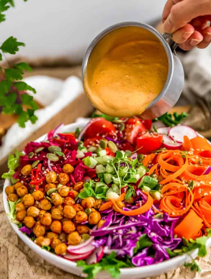 Pouring Oil Free Vegan Thousand Island Dressing