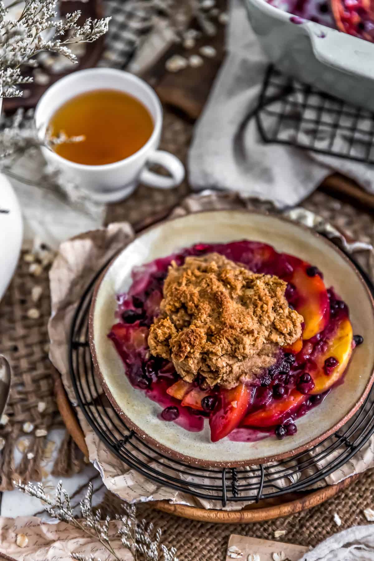 Tablescape of Peach Blueberry Biscuit Cobbler