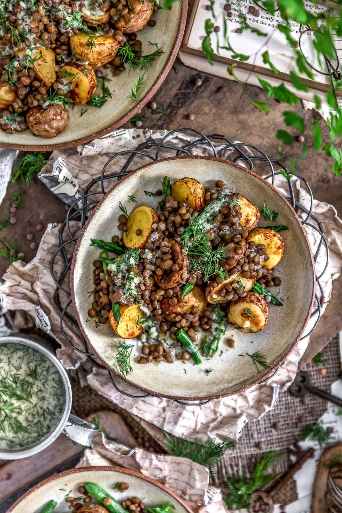 Plated Roasted Potatoes with Seasoned Lentils and Dill Sauce
