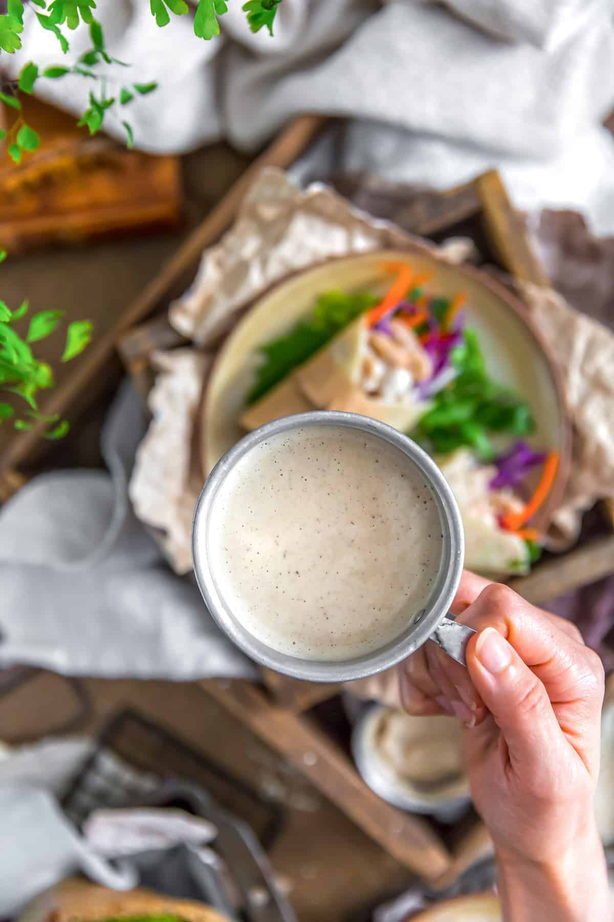 Vegan Tangy Honey Mustard Dressing in a cup