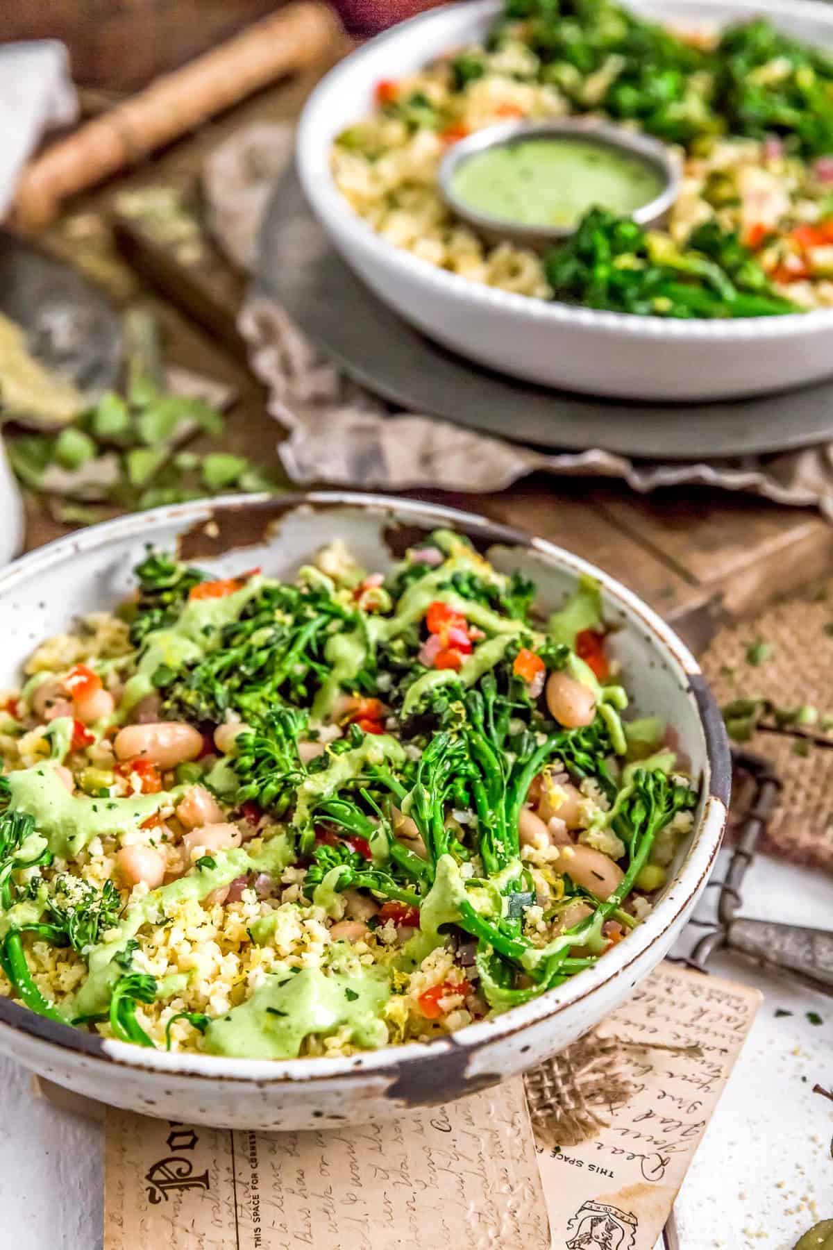 Two bowls of Italian Broccolini Millet Bowl with Lemony Parsley Sauce