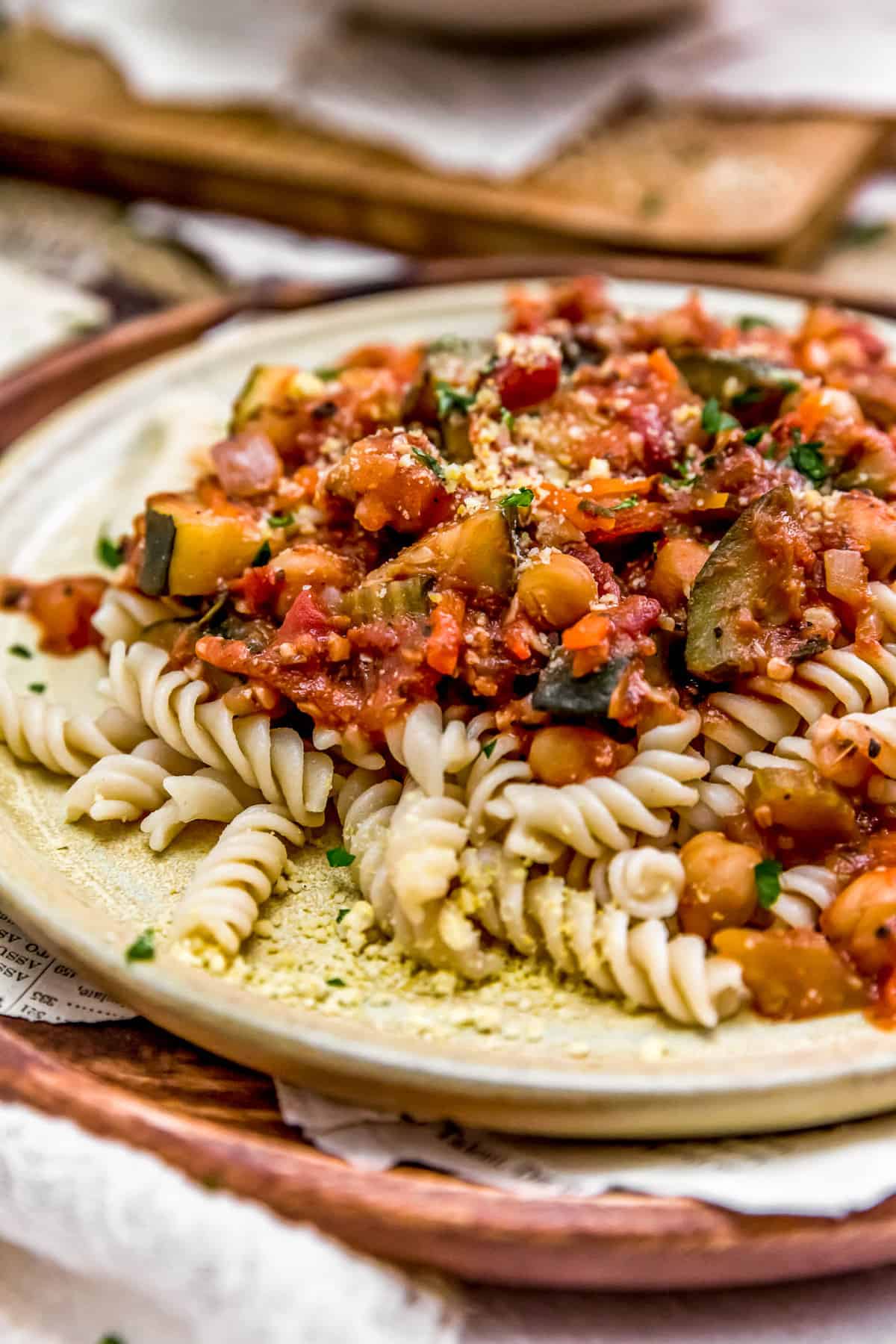 Close up of Italian Stewed Zucchini and Chickpeas over pasta