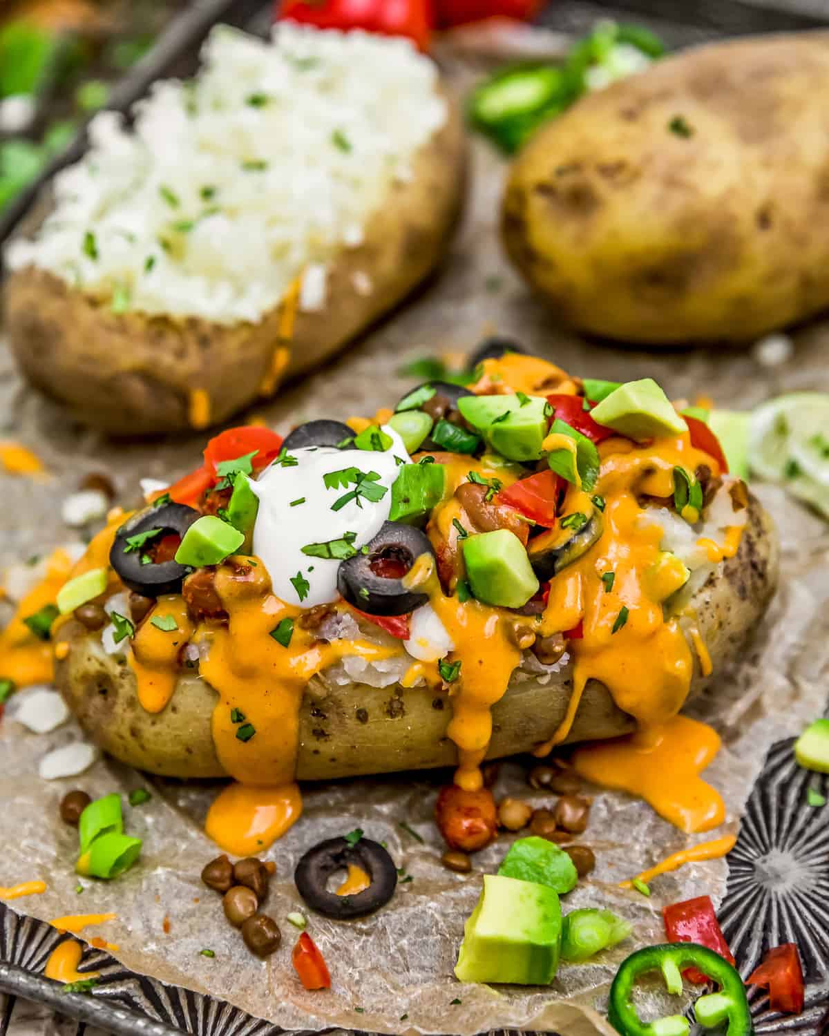 Loaded Baked Potato with Nut Free Vegan Nacho Cheese Sauce