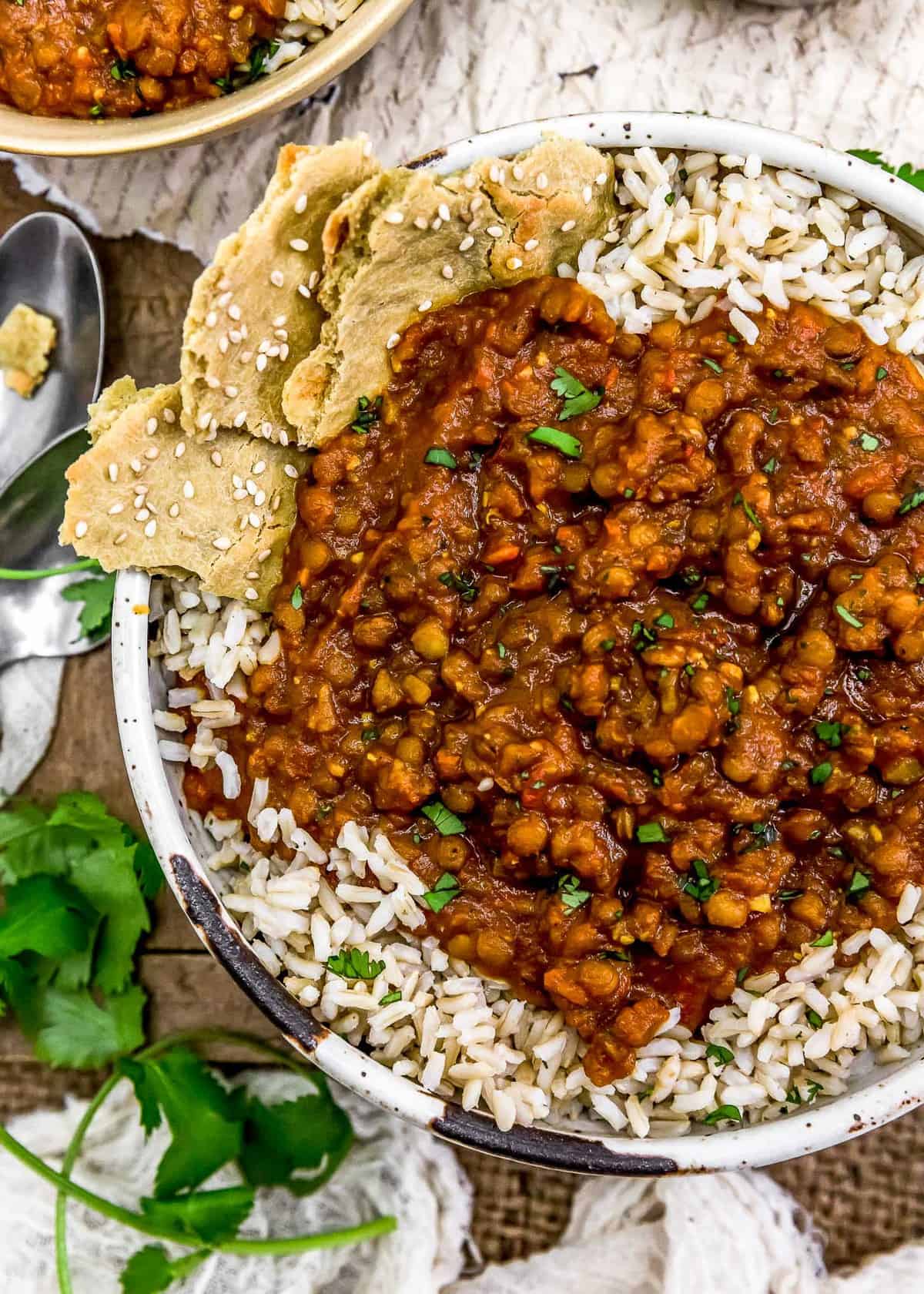 Creamy Lentil Curry over rice in a bowl