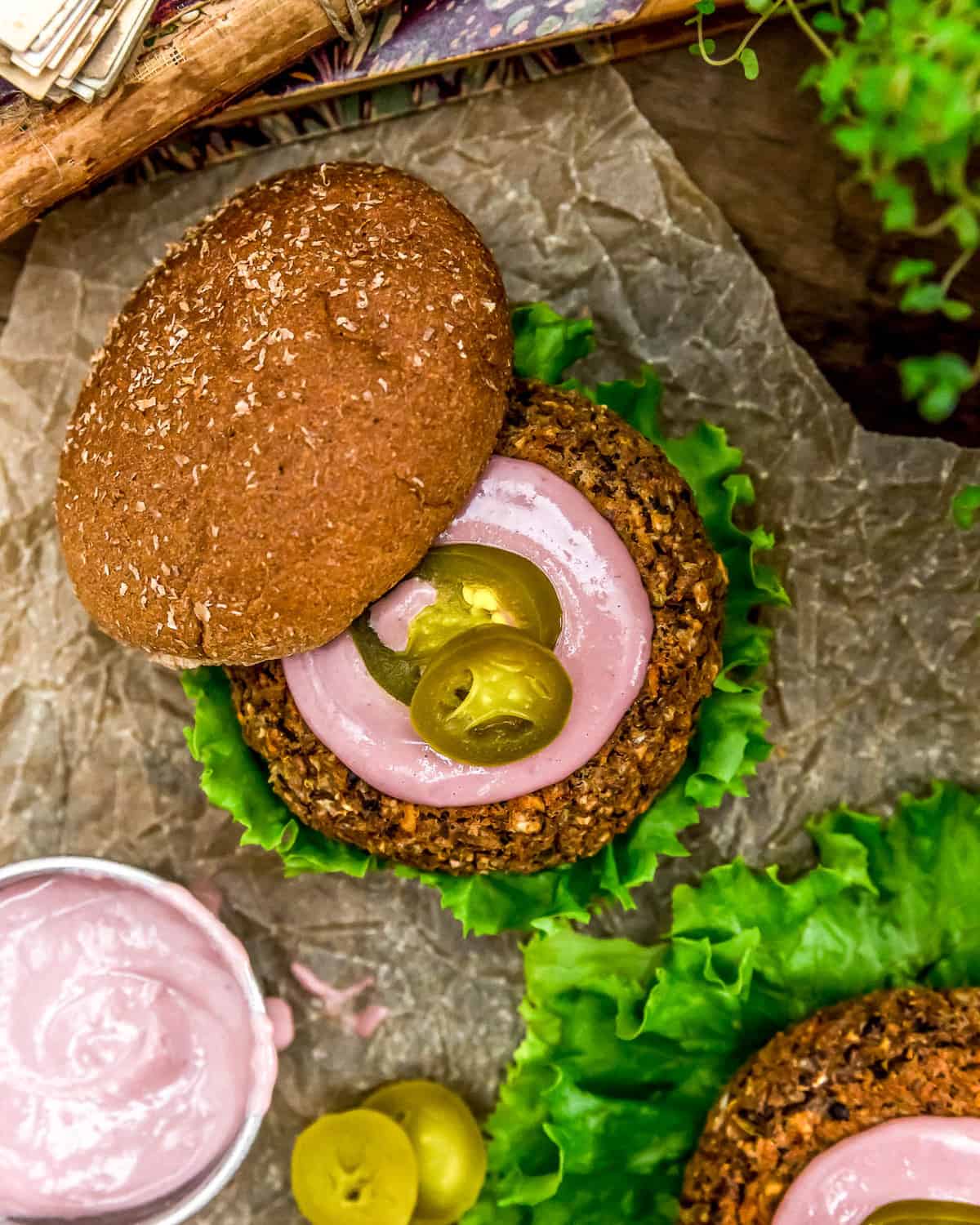 Vegan Pickled Jalapeño Raspberry Burger Sauce on a Burger