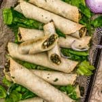 Vegan Spanakopita Rolls on a sheet tray