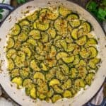 Simple Vegan Parmesan Zucchini in a skillet