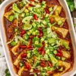 Vegan Enchilada Quesadilla Bake topped with fresh veggies