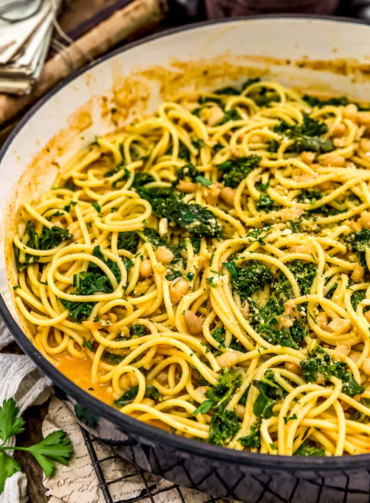 Close up skillet of Smoky Kale and Bean Pasta