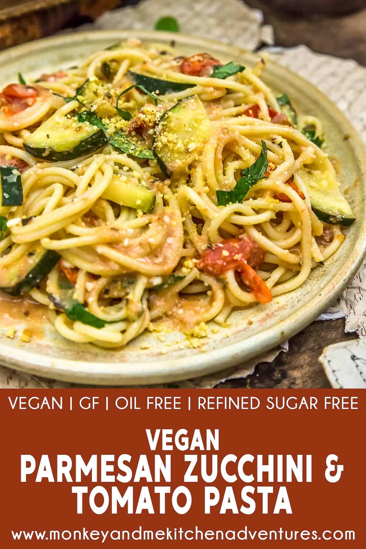 Vegan Parmesan Zucchini and Tomato Pasta with text description