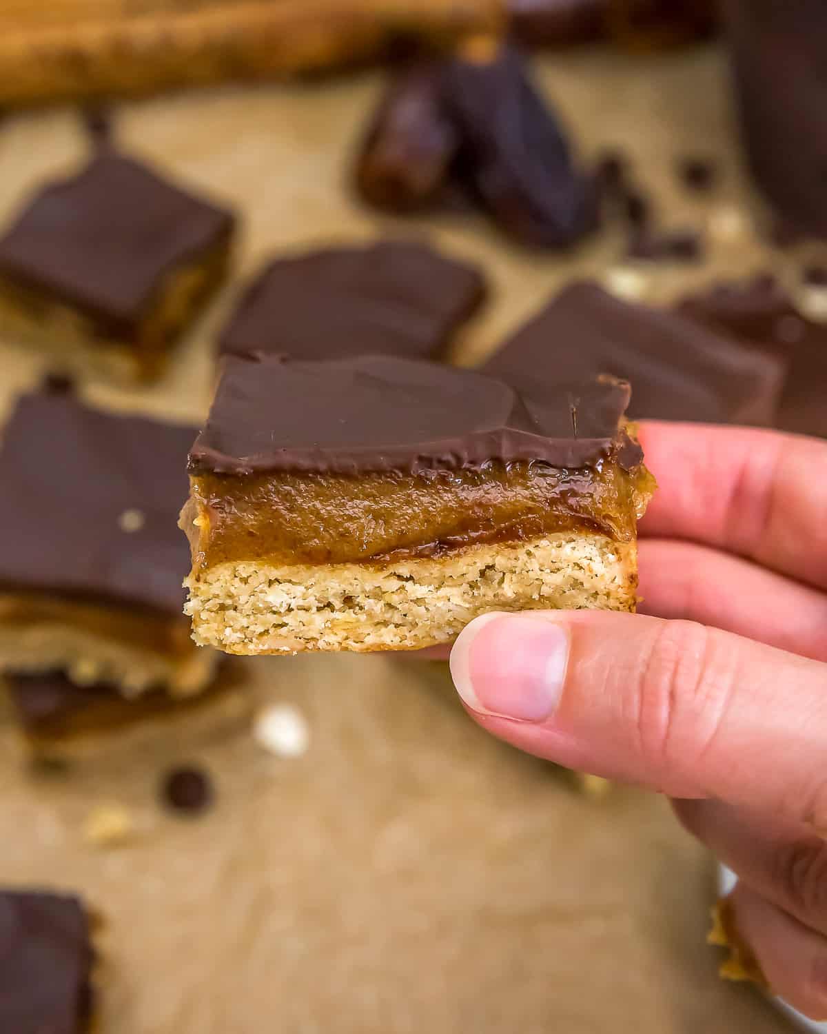 Holding a Vegan Millionaire Bar