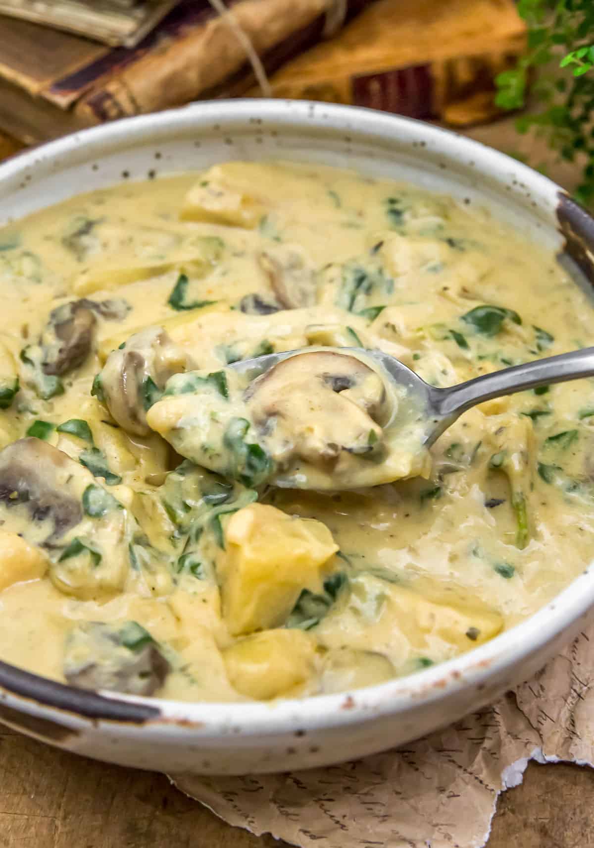 Eating Creamy Herb Potato and Kale Stew