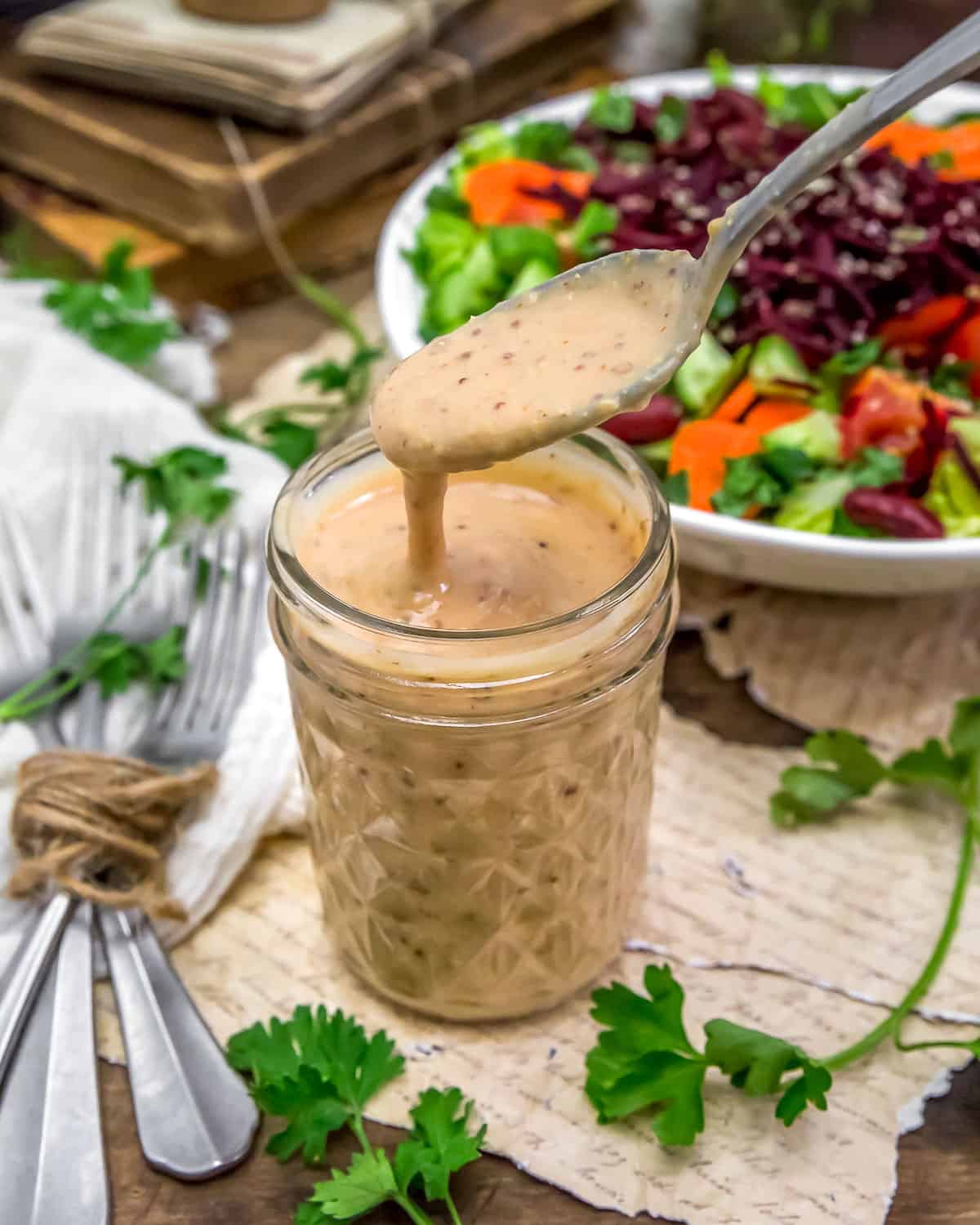 Oil Free Tangy Thousand Island Hummus Dressing in a jar