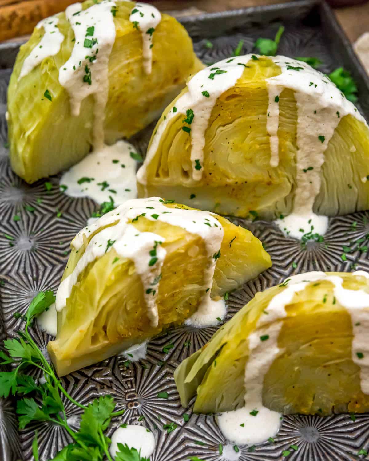 Close up of Instant Pot Cabbage Wedges with Horseradish Cream