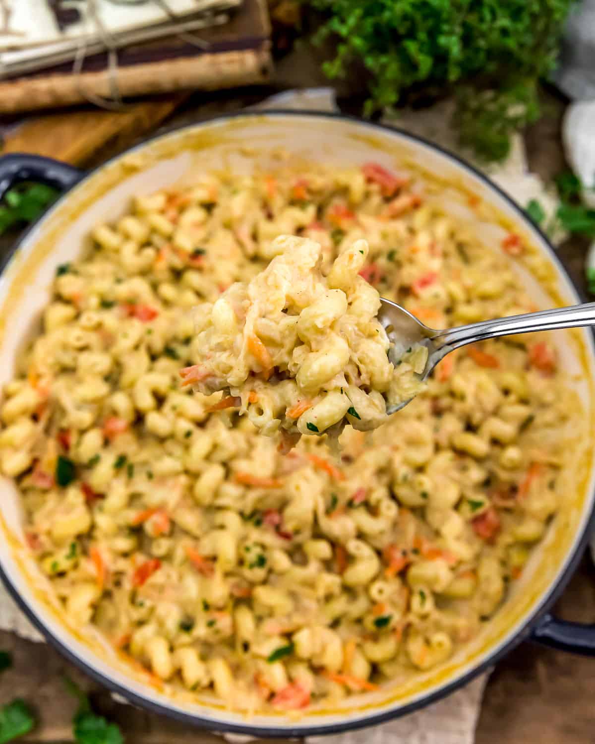 Spoon of Vegan Creamy Sauerkraut Pasta Skillet