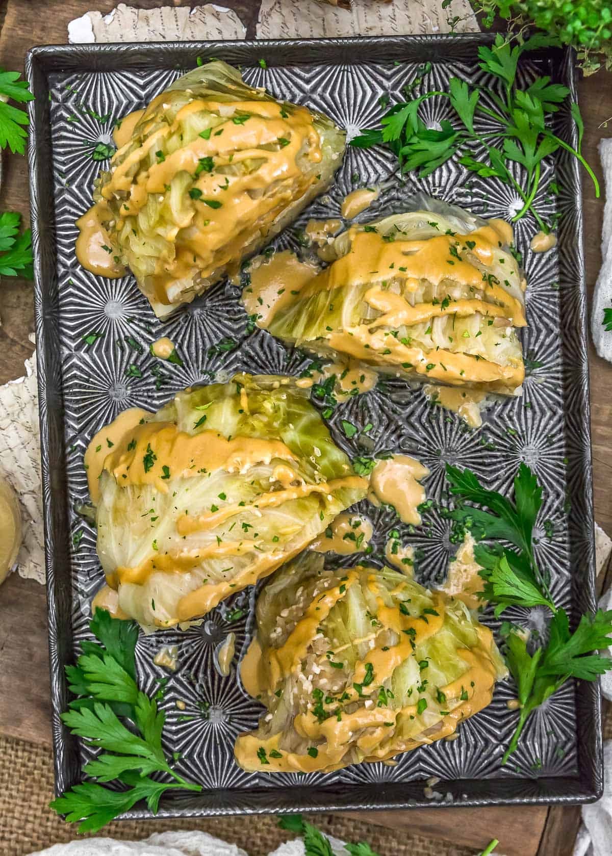 Baking sheet of Instant Pot Cabbage Wedges with Garlic Tahini Sauce