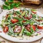 Close up of Asparagus Tomato Salad with Dijon Dressing