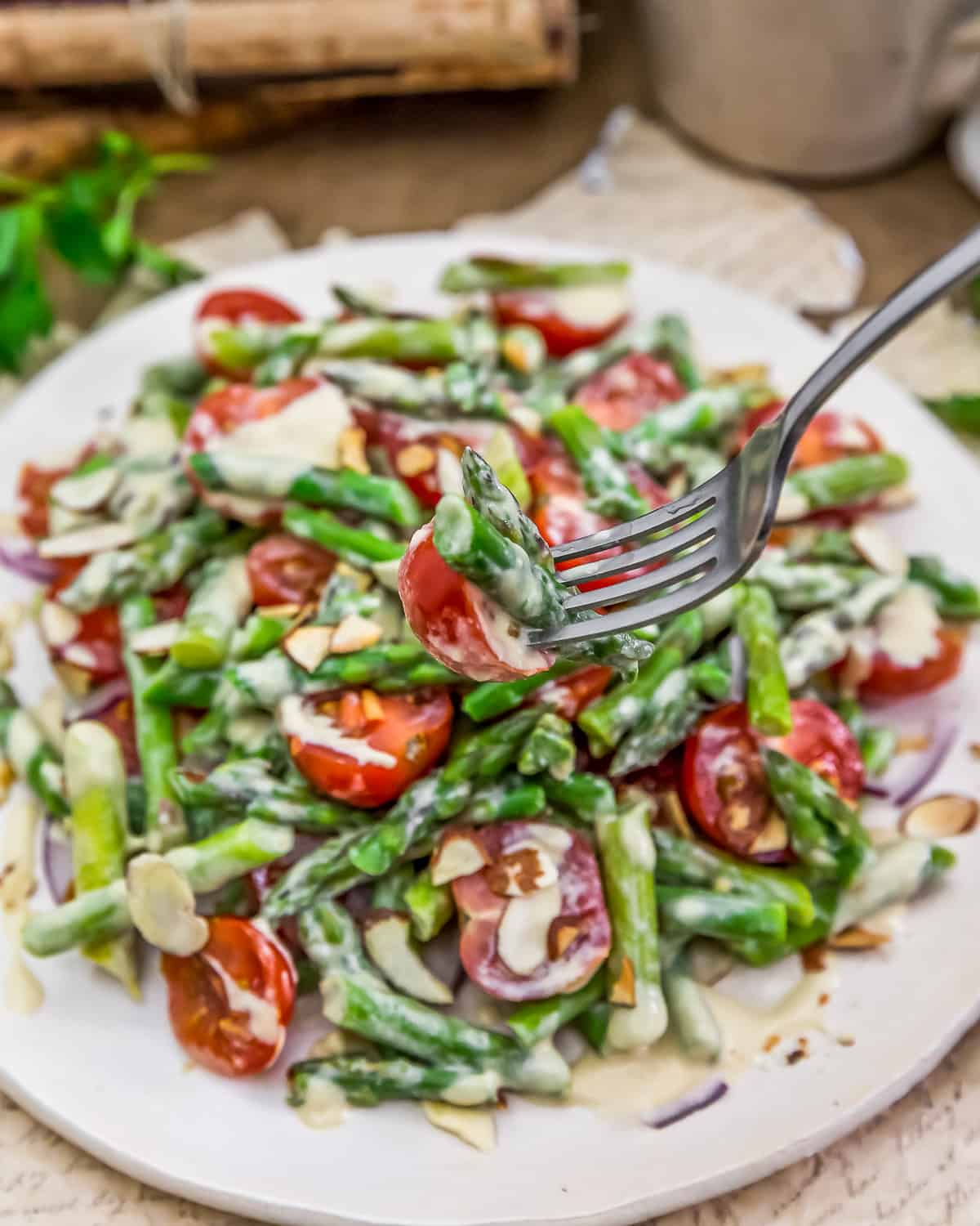 Forkful of Asparagus Tomato Salad with Dijon Dressing