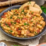 Easy Greek Brothy Beans in bowl with pita bread