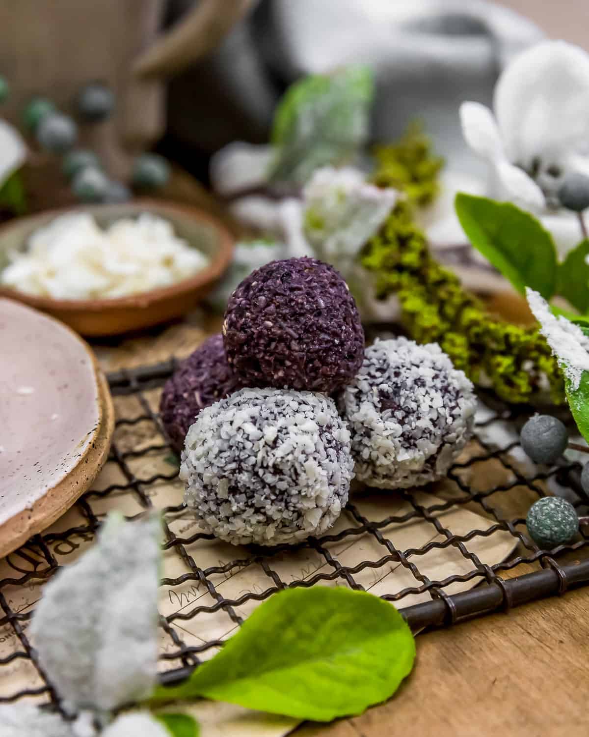 No Bake Blueberry Bliss Balls on a rack