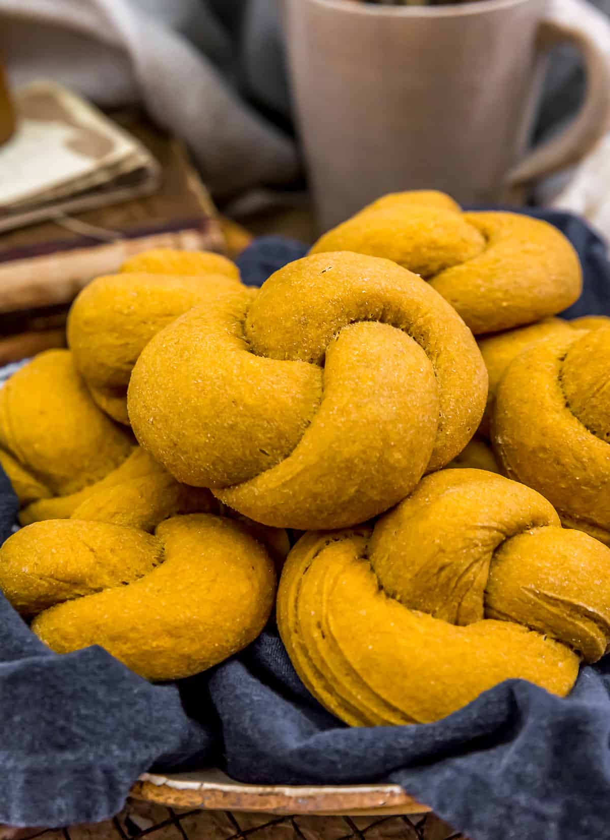 Basket of Whole Grain Pumpkin Knot Rolls