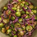 Bowl of Warm Caraway Brussels Sprouts Onion Salad