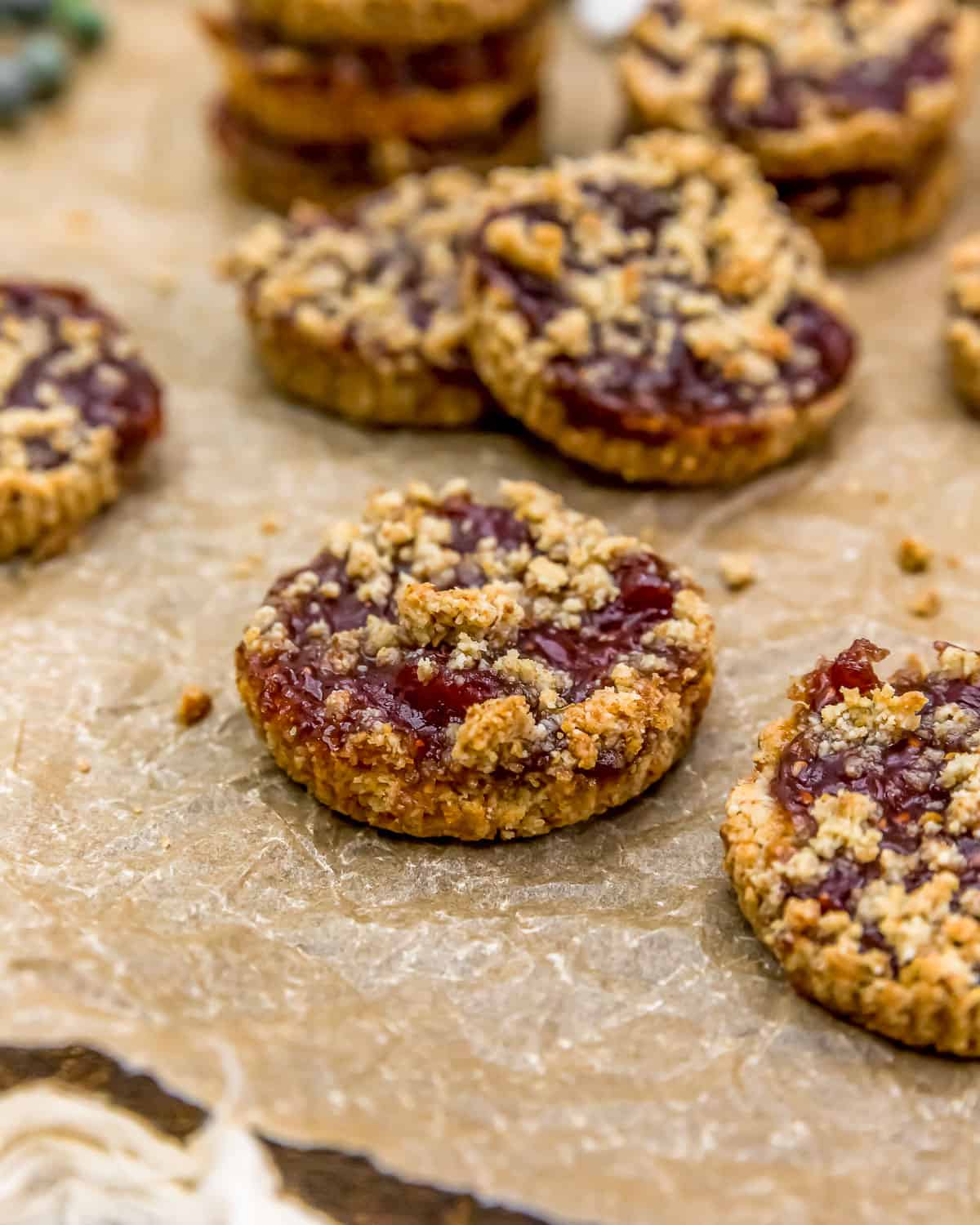 Vegan Raspberry Crumble Cookies on parchment paper
