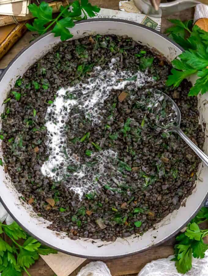 Skillet of Vegan Lentilles du Puy with Spinach and Crème Fraiche