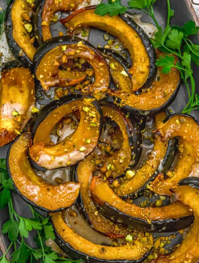 Close up of Roasted Acorn Squash with Maple Sauce and Pistachios