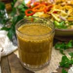 Glass of Oil Free Vegan Cheesy Dijon Dressing