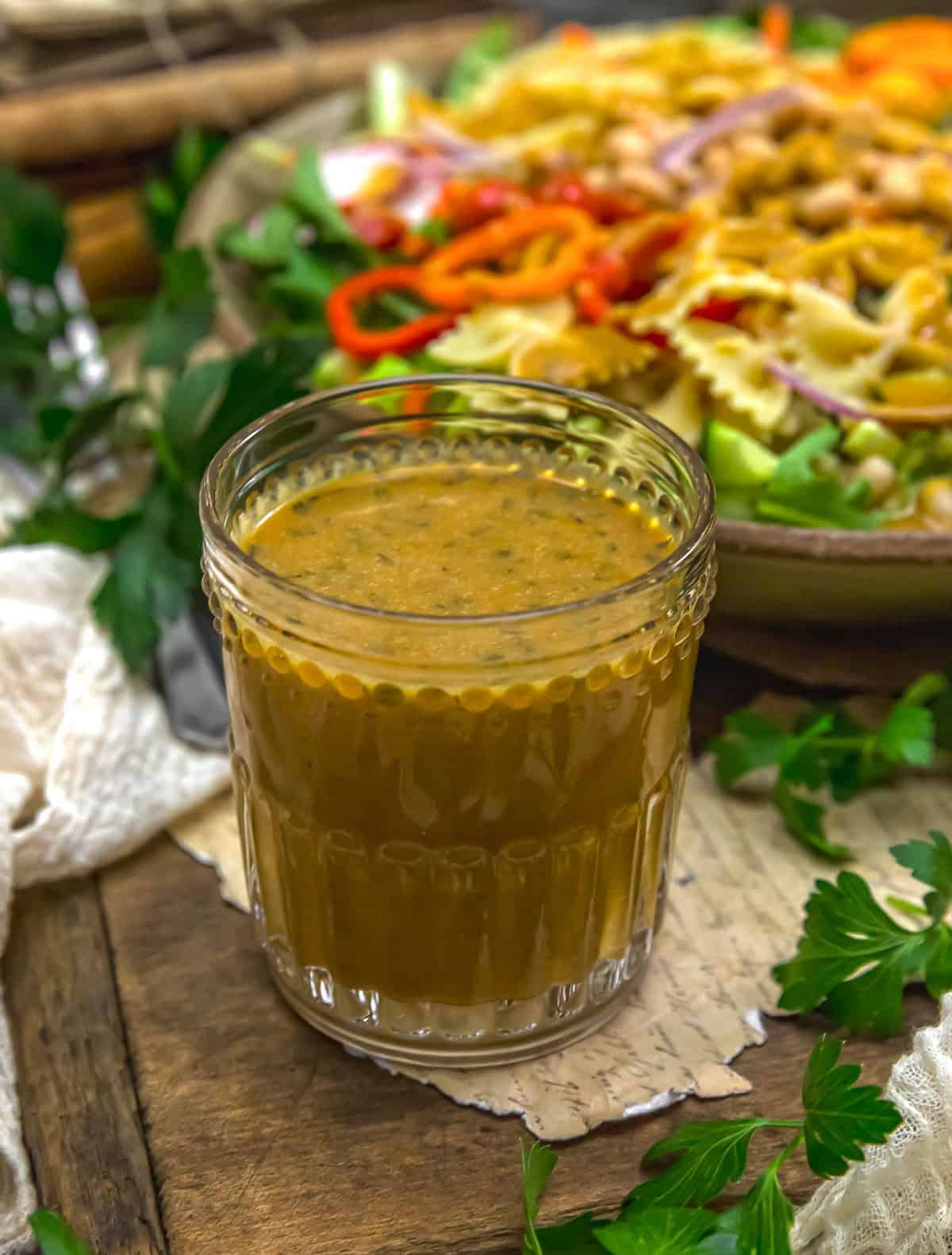 Glass of Oil Free Vegan Cheesy Dijon Dressing