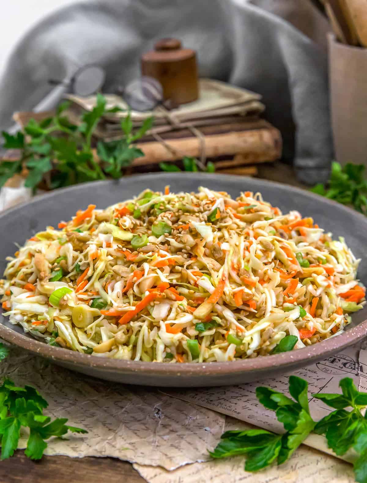 Oil-Free Crunchy Cabbage Slaw with Orange-Tahini Dressing in a bowl