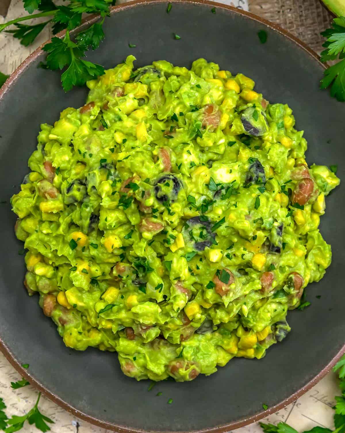 Bowl of Guacamole with Pinto Beans and Corn