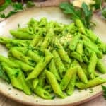 Close up of Vegan Arugula Pesto Parmesan Pasta