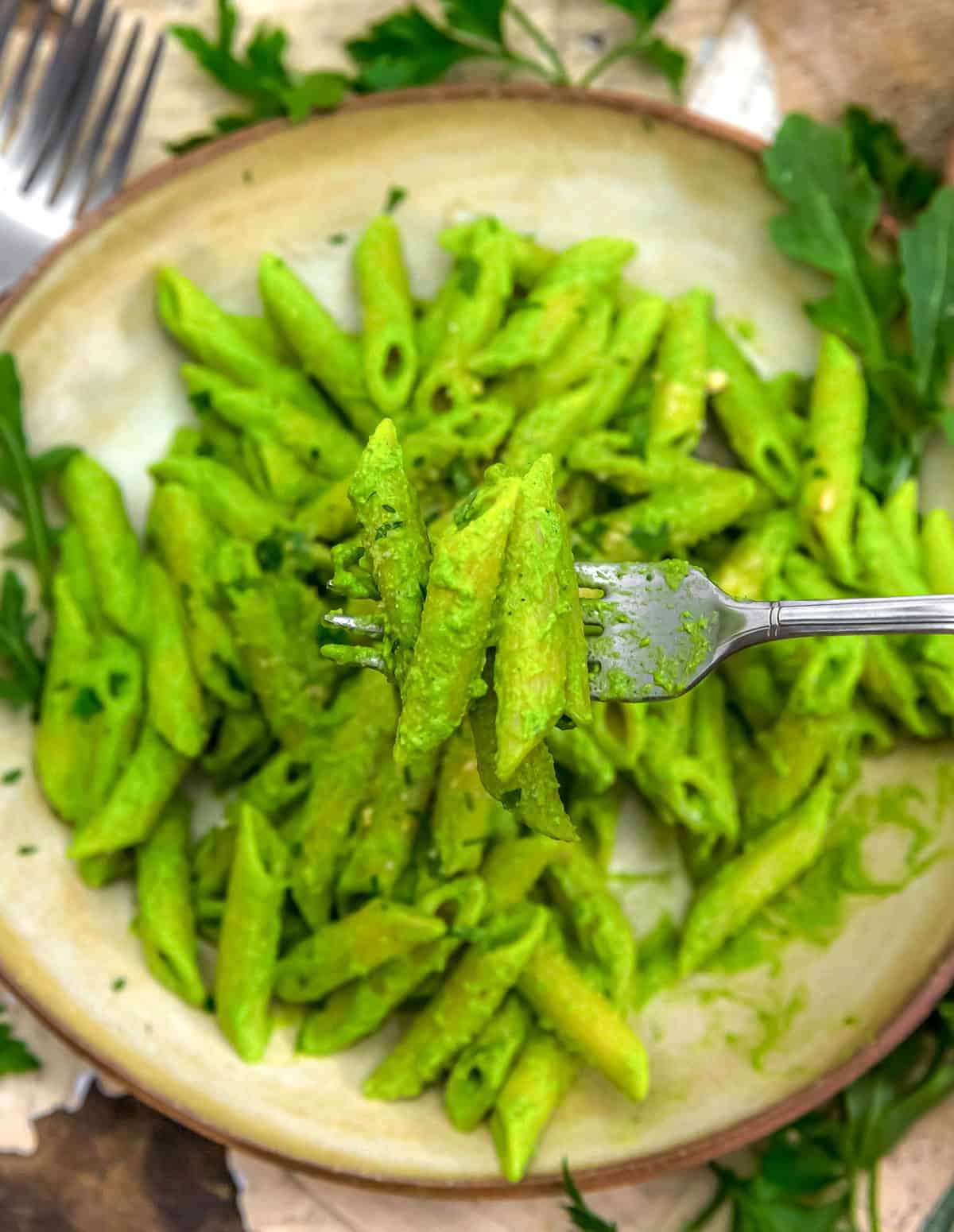 Forkful of Vegan Arugula Pesto Parmesan Pasta