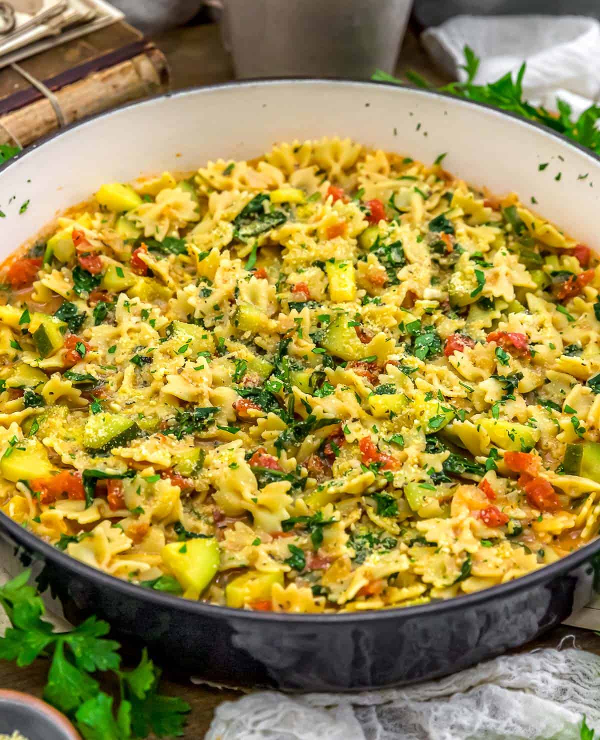 Close up of Vegan Parmesan Zucchini Spinach Pasta Skillet
