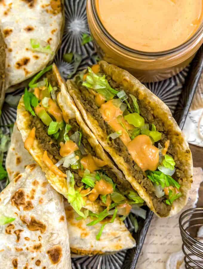 Close up of Big Mac Smashed Lentil Tacos with toppings