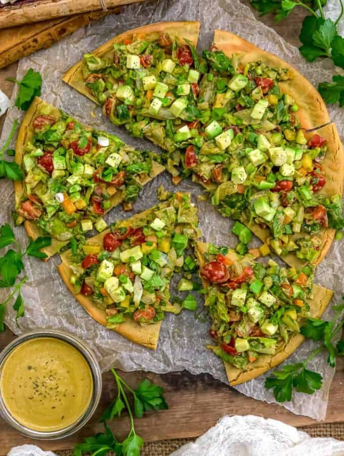 Garden Salad Flatbread Pizza with side of sauce