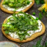 Vegan Asparagus Ricotta Flatbread Pizza on a baking sheet